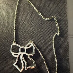 SILVER BOW NECKLACE